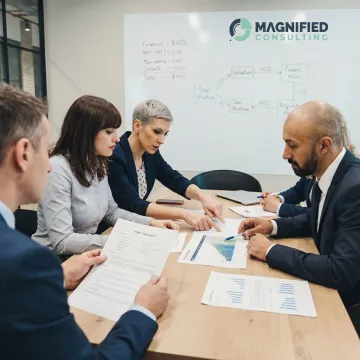 Advisors reviewing startup M&A strategy
