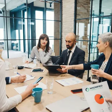 Business consultants analyzing company performance data