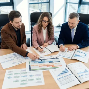 Consultants reviewing operational transformation roadmap