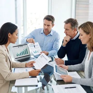Business consultants discussing profit enhancement strategy
