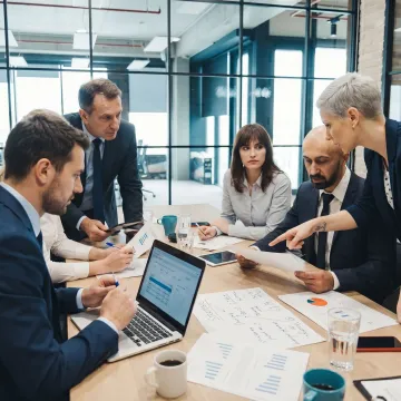 Consultants advising business owners on strategic planning