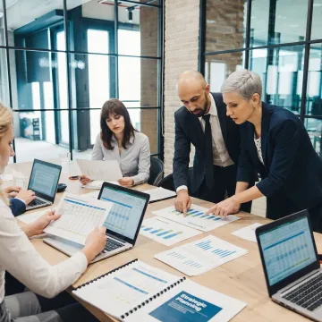 Financial advisors reviewing business strategy