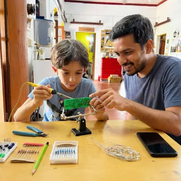 Hands-on micro soldering training with tools and components