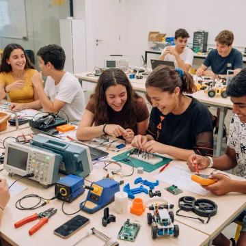 Students engaged in hands-on experiential learning