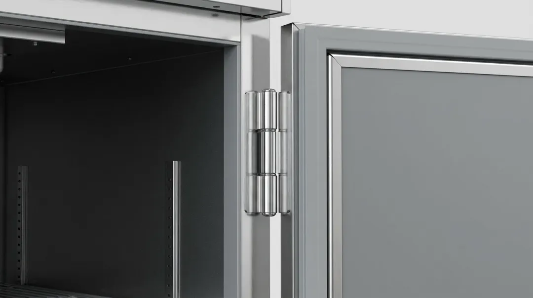 Commercial foodservice equipment door with full-length continuous piano hinge installed
