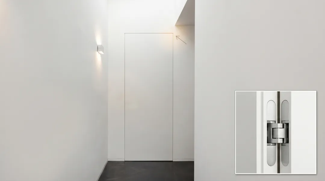 Concealed architectural door hinge installed flush inside wood door frame