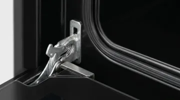 Appliance oven door gasket seal alignment showing gap measurement and hinge wear