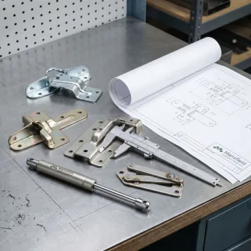 Custom strap hinge manufacturing components