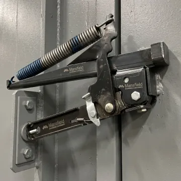 Custom pivot hinge assembly for industrial OEM door