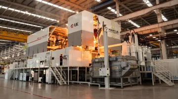High-pressure aluminium die casting machine operating on industrial production floor
