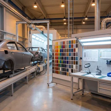Automotive powder coating on metal components