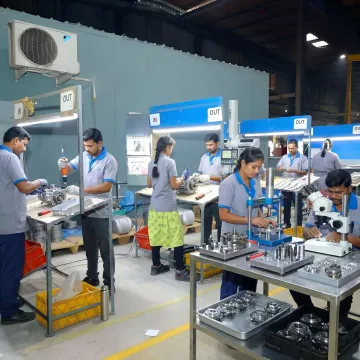 Mechanical assembly technicians building industrial components