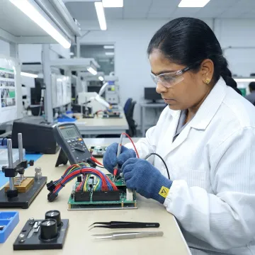 Technician testing an electronic subassembly