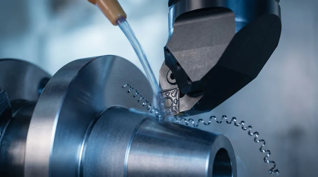 Titanium Ti-6Al-4V aerospace component being precision CNC machined in industrial facility