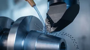 Titanium Ti-6Al-4V aerospace component being precision CNC machined in industrial facility