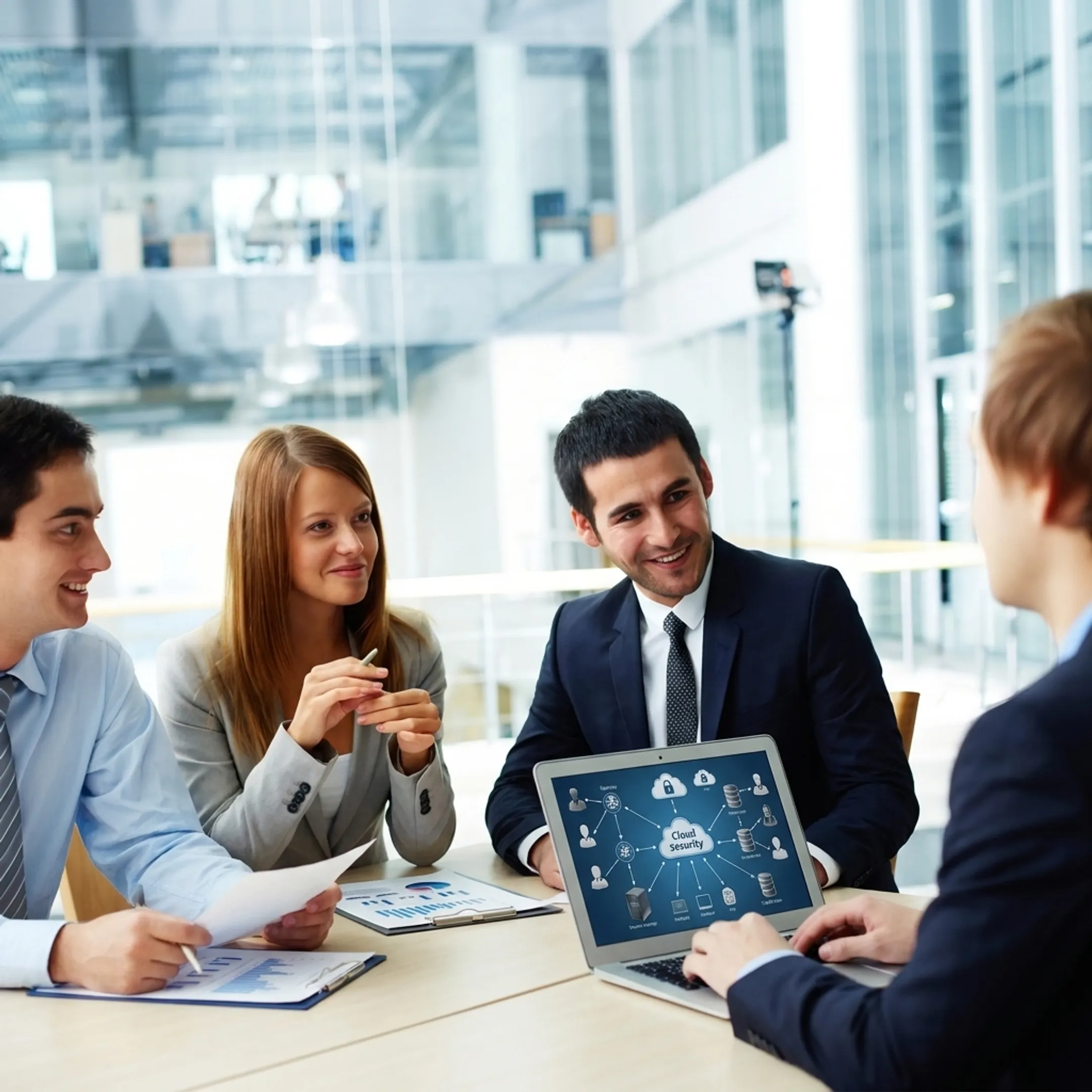 IT consultant discussing technology strategy with business leaders