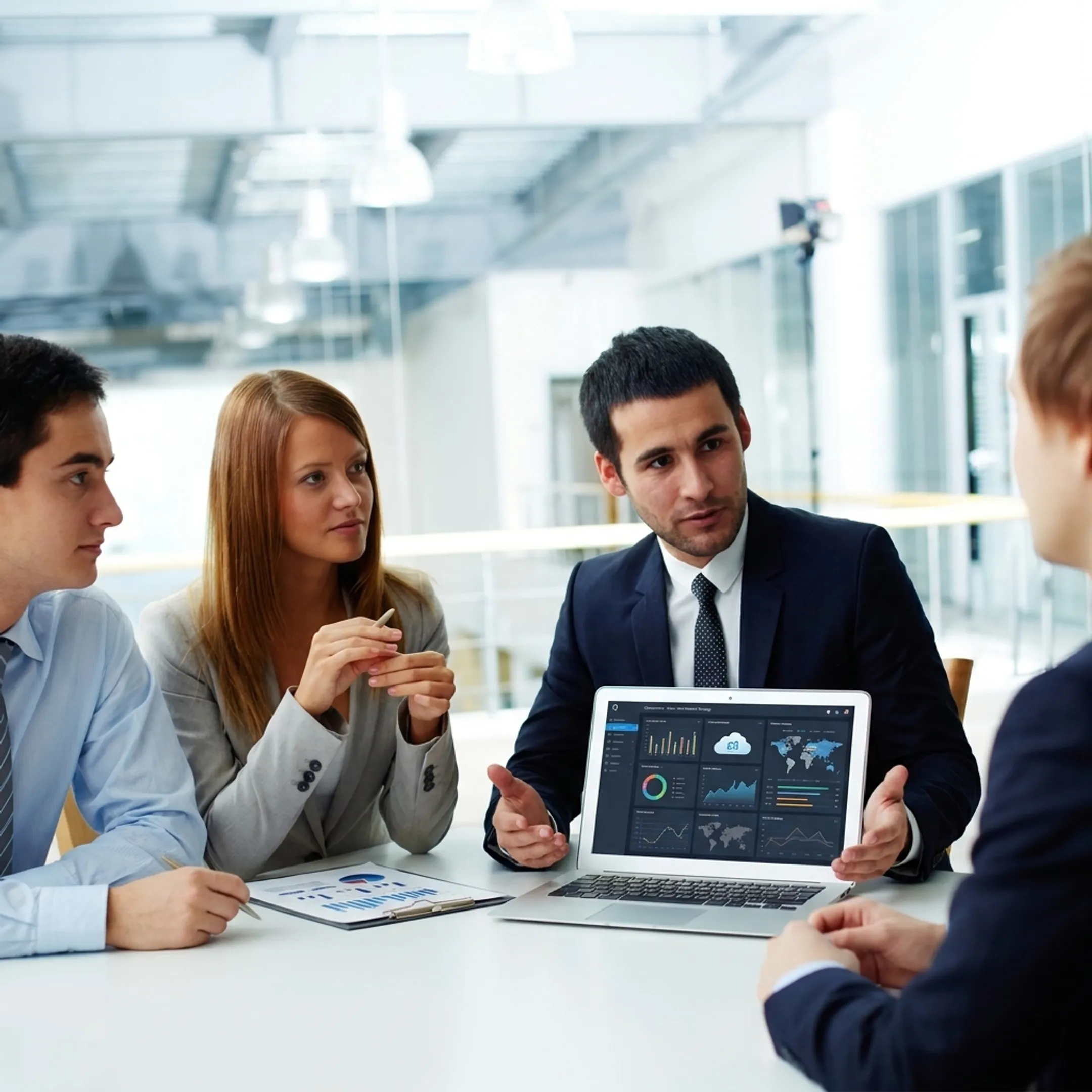 IT consultant discussing technology strategy with business leaders
