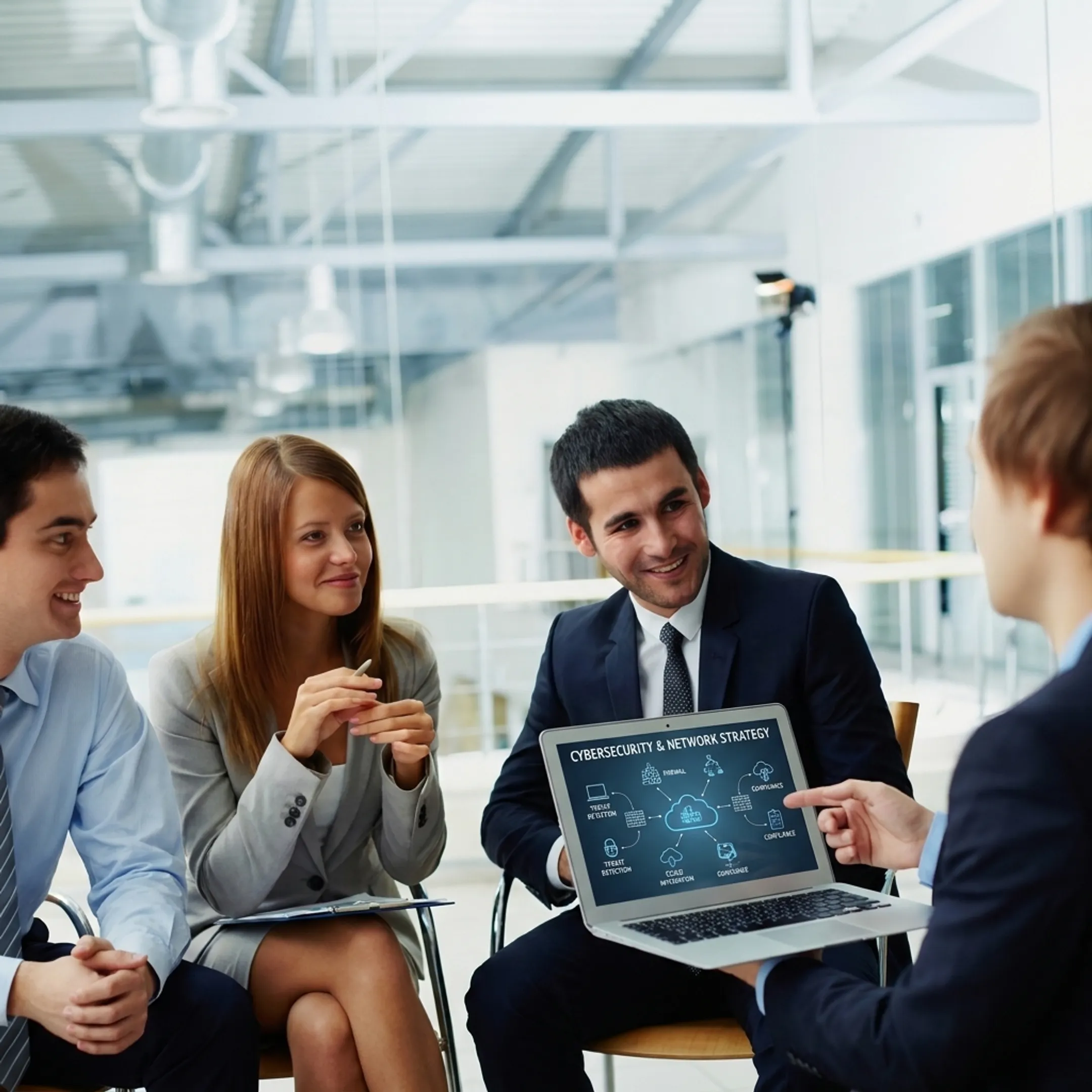 IT consultant reviewing technology plan with client