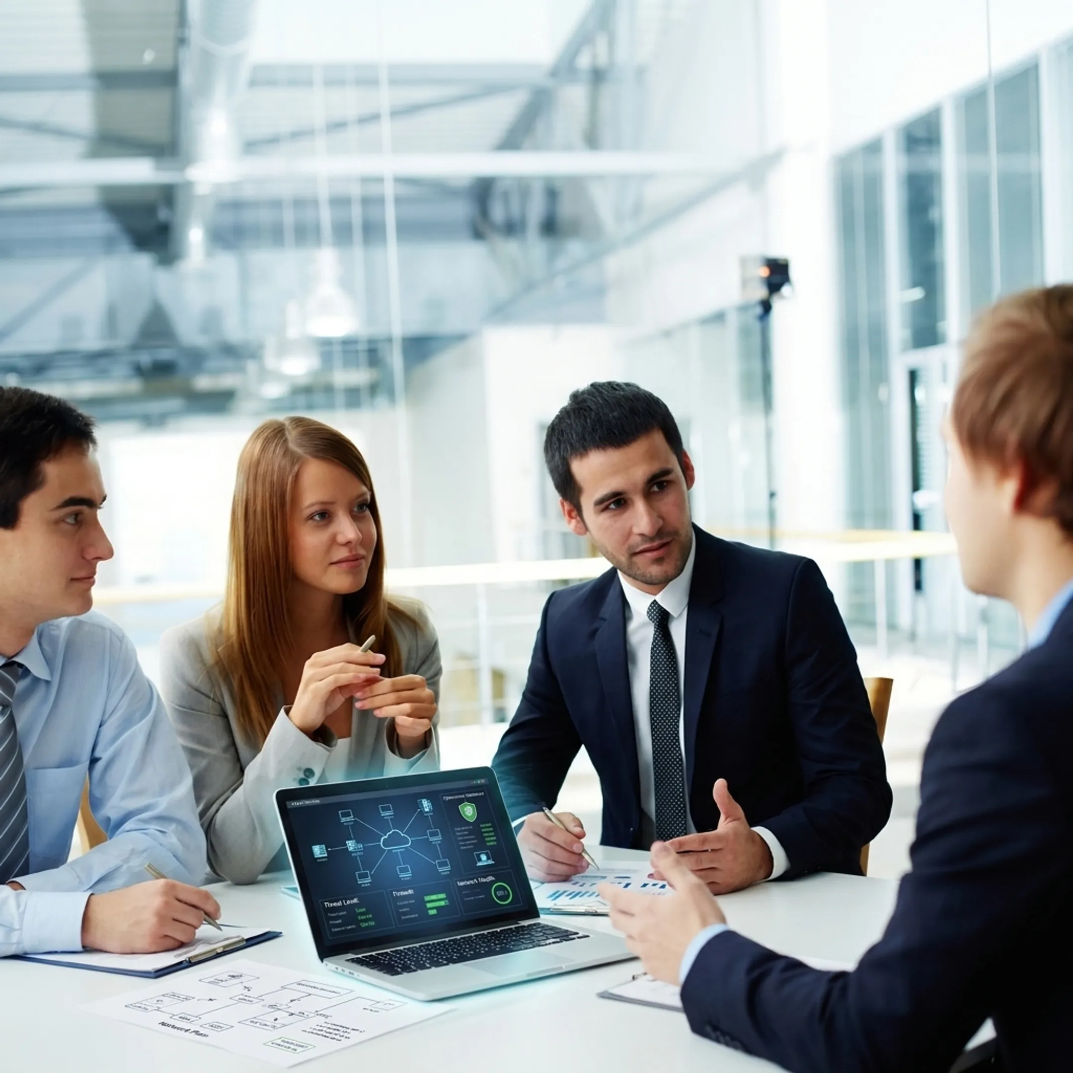 Technology advisor discussing IT strategy with business owners
