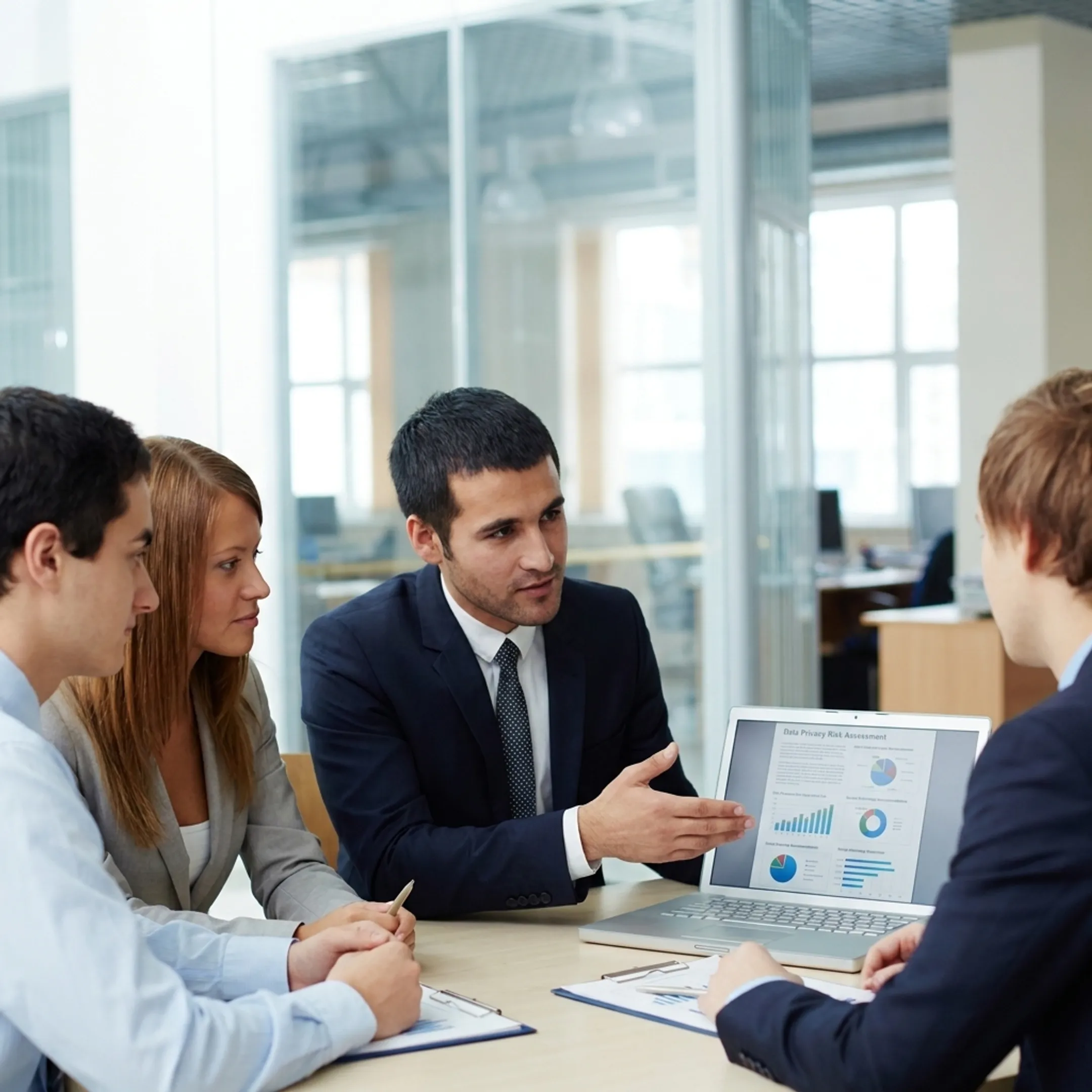 IT consultant discussing privacy risk findings with business leaders