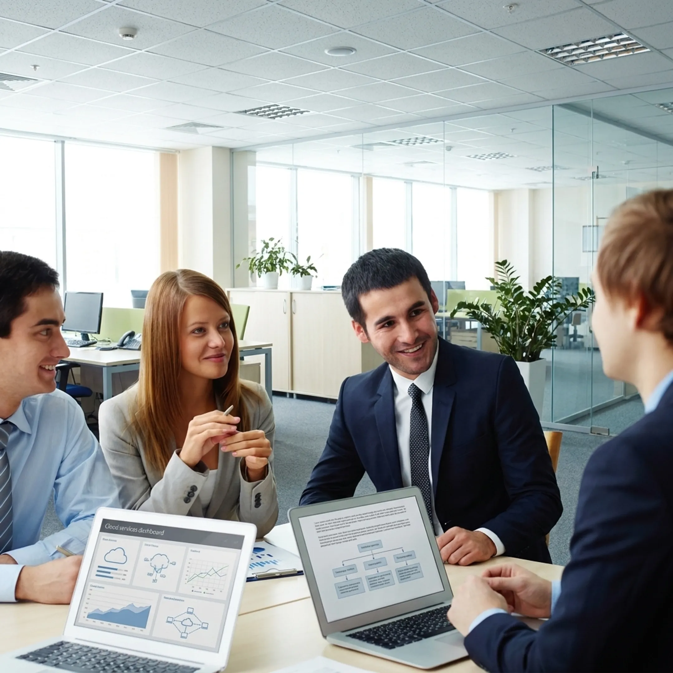 Nonprofit team collaborating with IT consultant