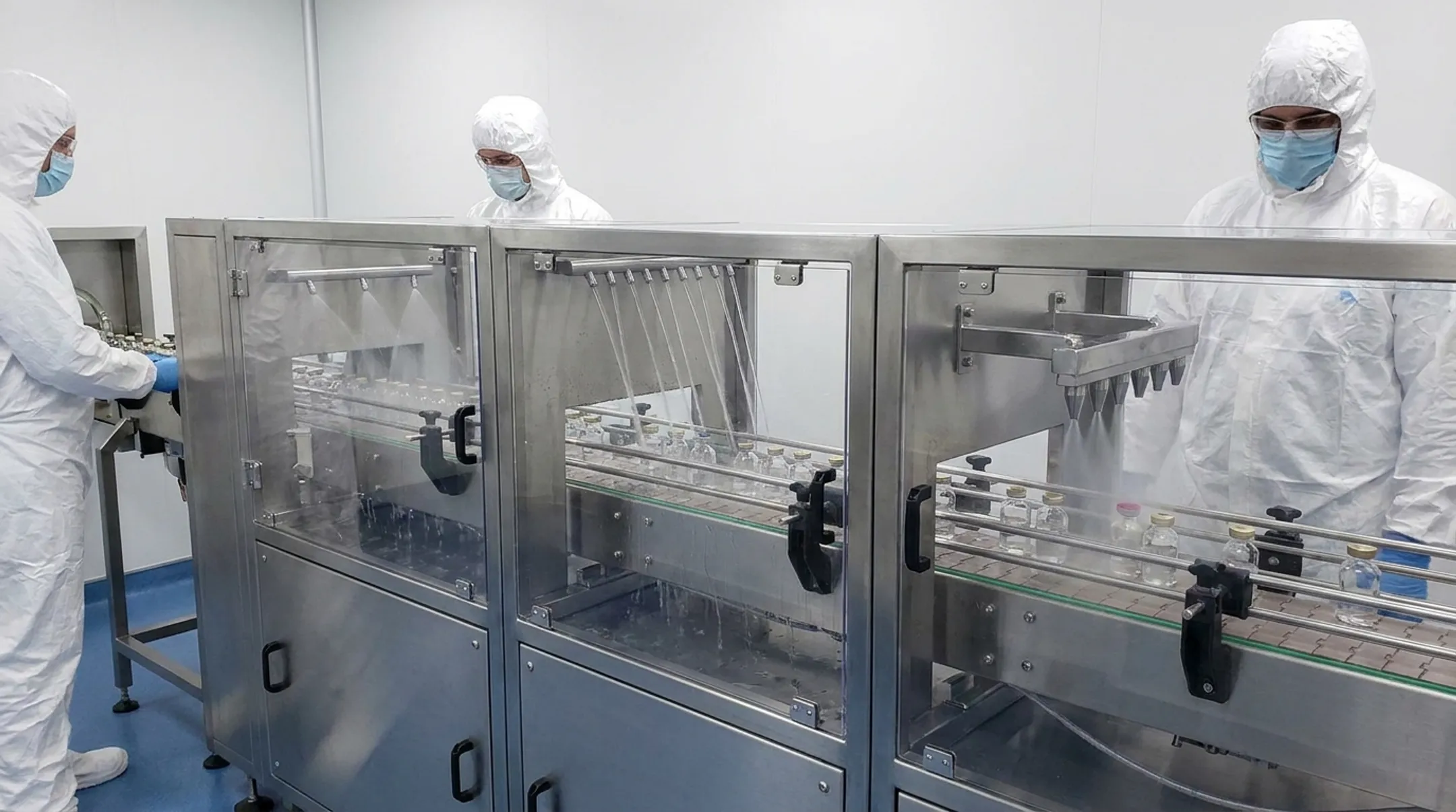 McBrady exterior vial washer dryer cleaning filled capped pharmaceutical containers
