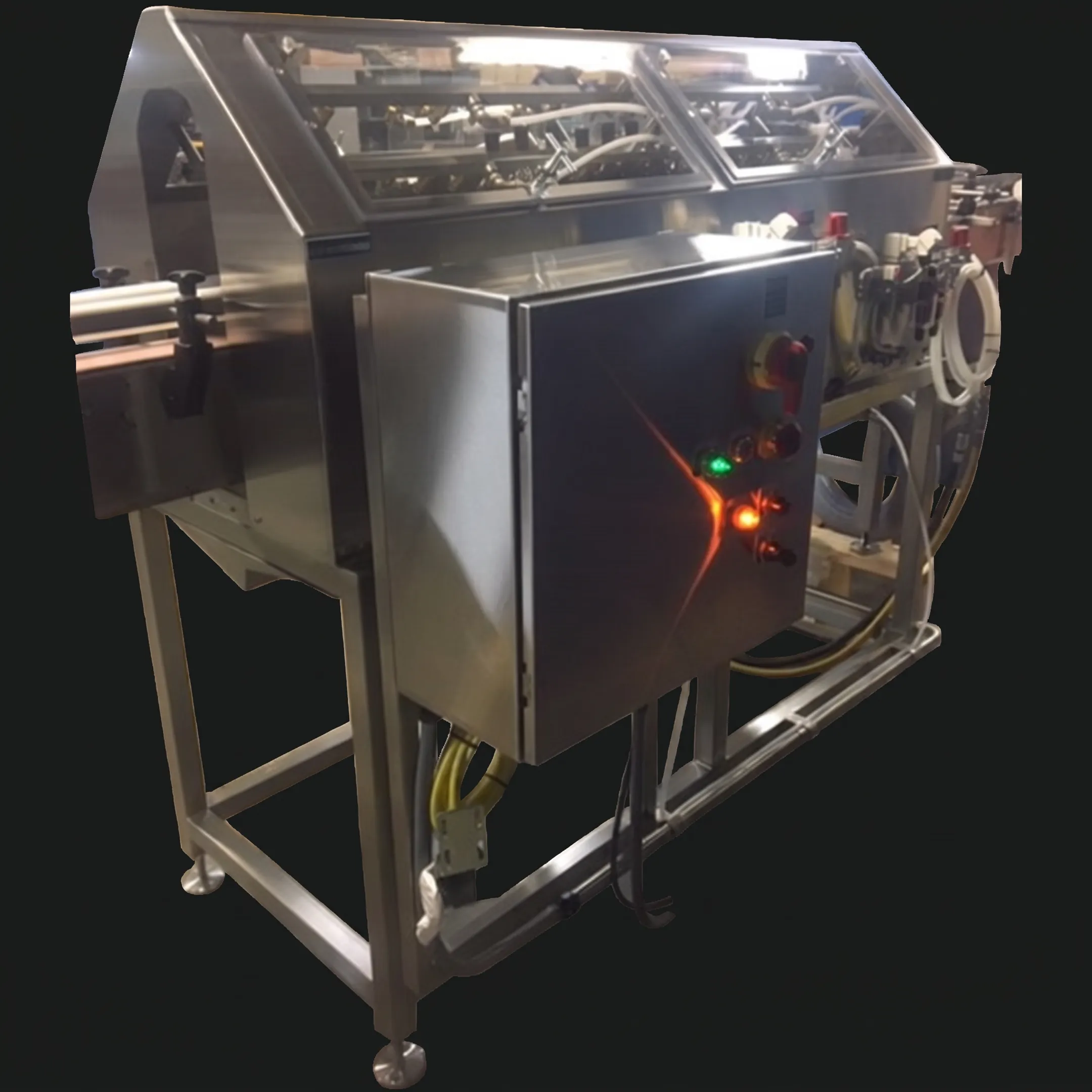 Engineers reviewing a custom packaging machine in a fabrication facility