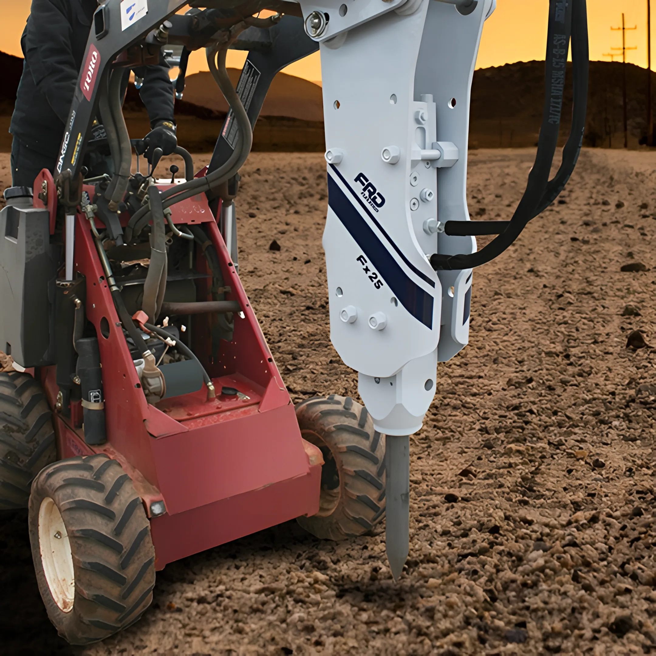 Utility contractor using a hydraulic breaker