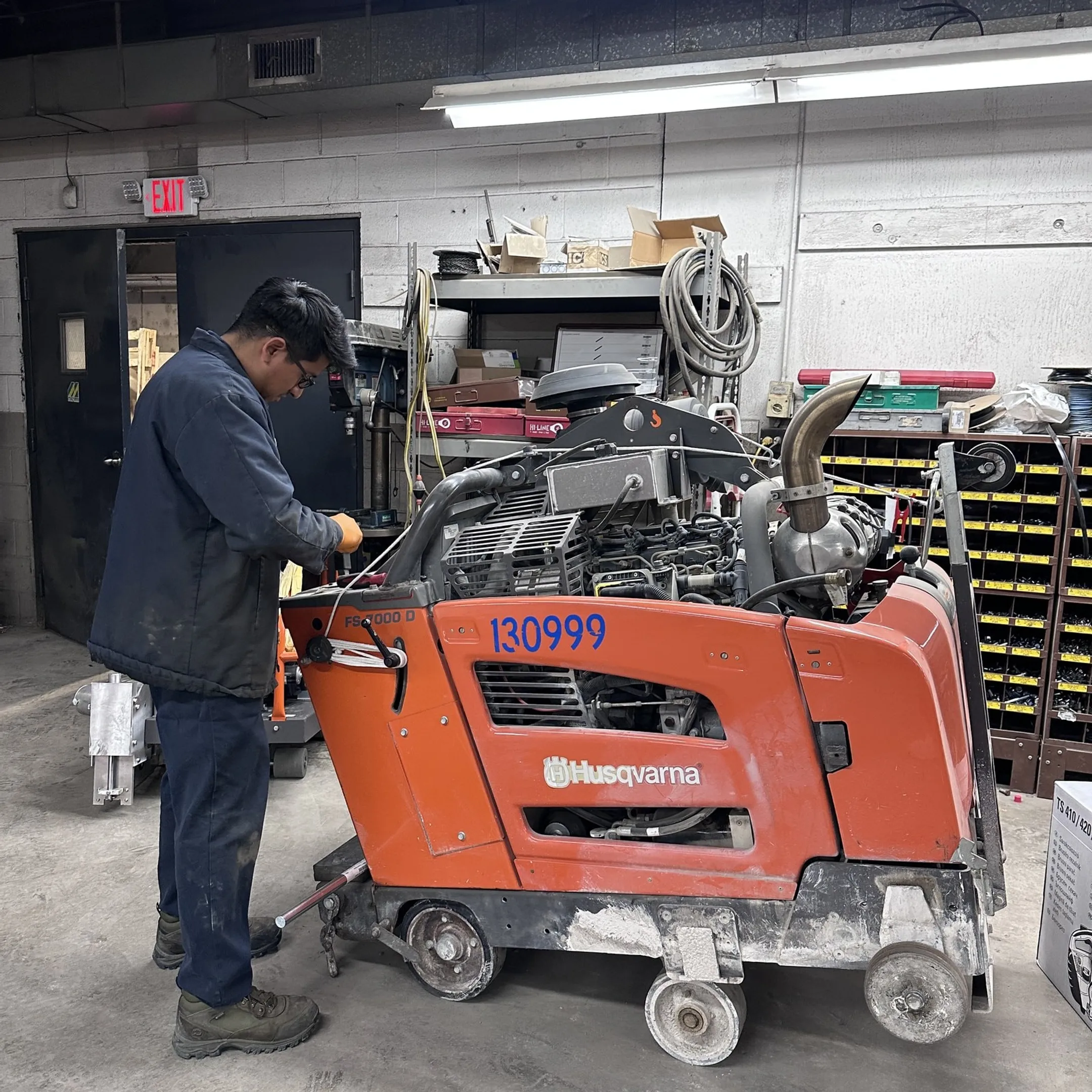 McCann technician diagnosing construction equipment