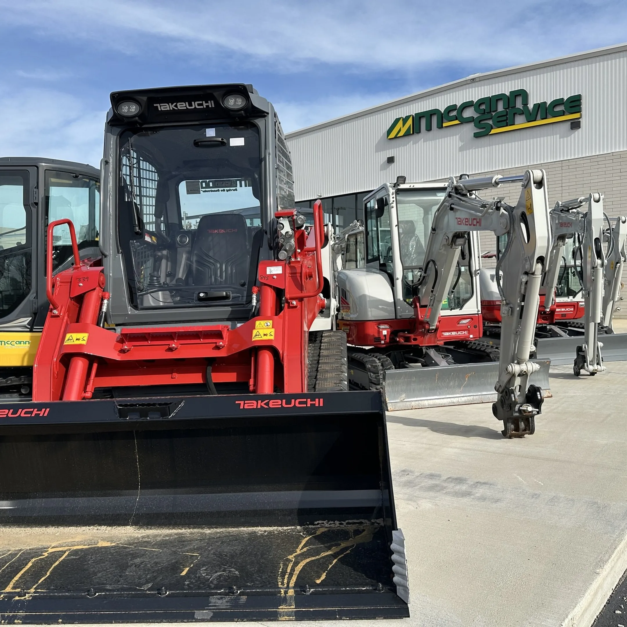Contractor reviewing construction equipment telematics on a mobile device