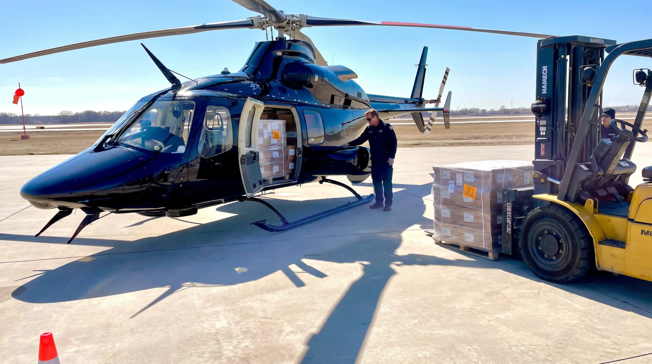 McMahon Bell 430 helicopter standing ready for cargo charter dispatch