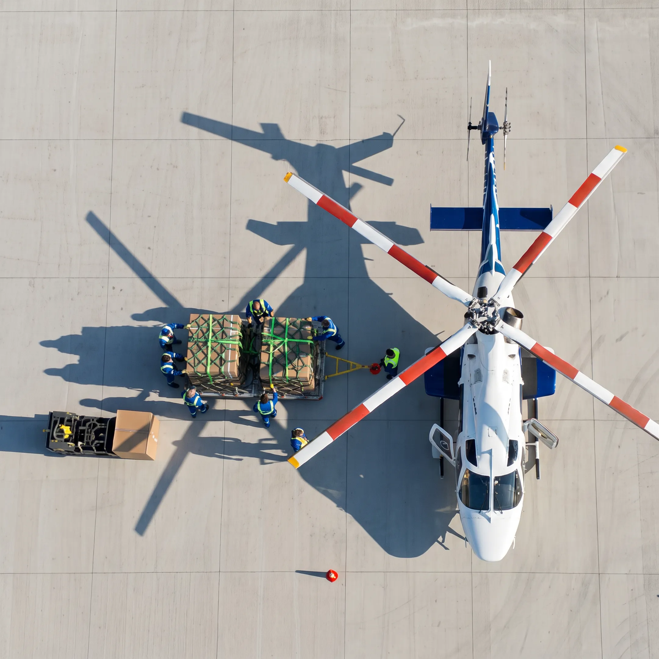 Bell 430 helicopter loading urgent cargo