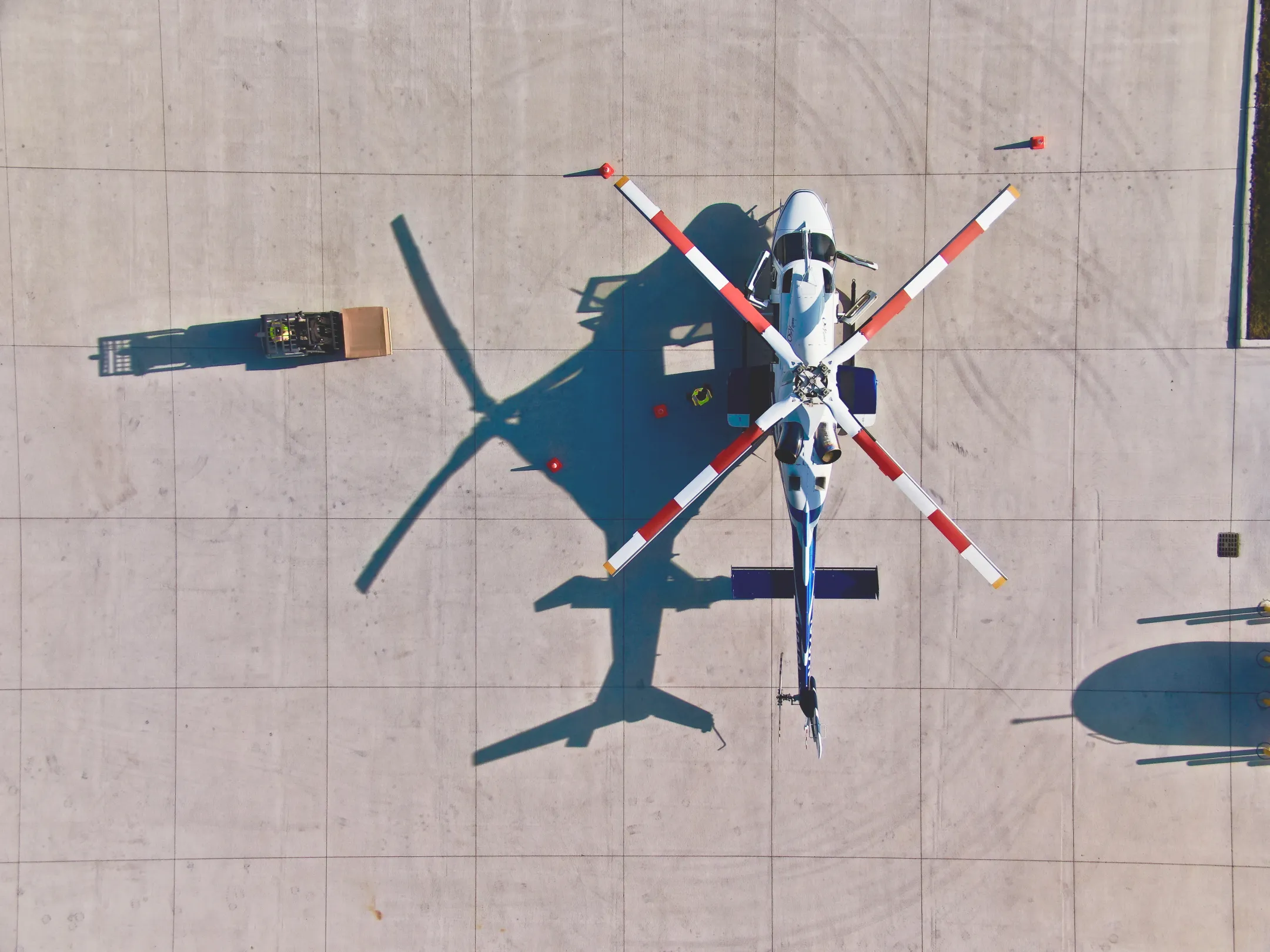 Logistics team coordinating helicopter cargo delivery