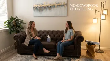 Therapist conducting EMDR trauma-focused counseling session with client