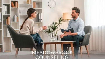 Therapist and patient in CBT session practicing mindfulness and cognitive techniques