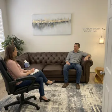 Therapist and client in a calm counseling office