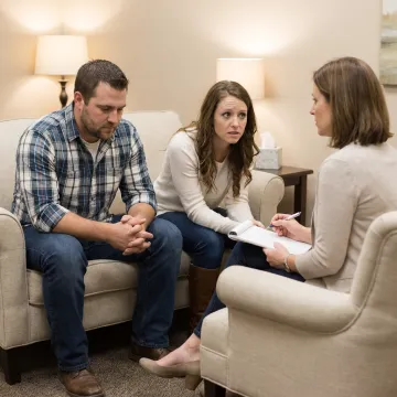 Couple in infidelity counseling session