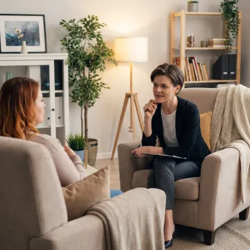 Therapist supporting client through relationship healing