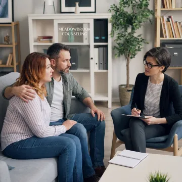 Parents in a calm couples counseling session
