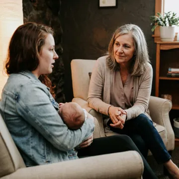 Postpartum therapist speaking with a new parent