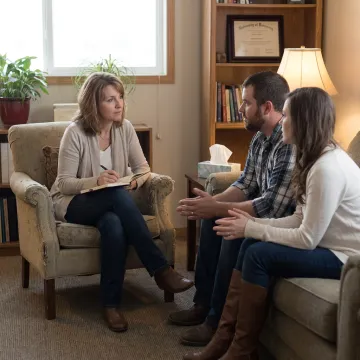 Couple meeting with a marriage counselor in Utah