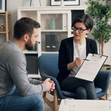 Therapist guiding client through anxiety treatment planning