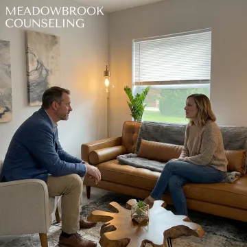 Therapist offering supportive counseling in a private office