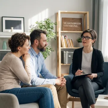 Couple speaking with a therapist