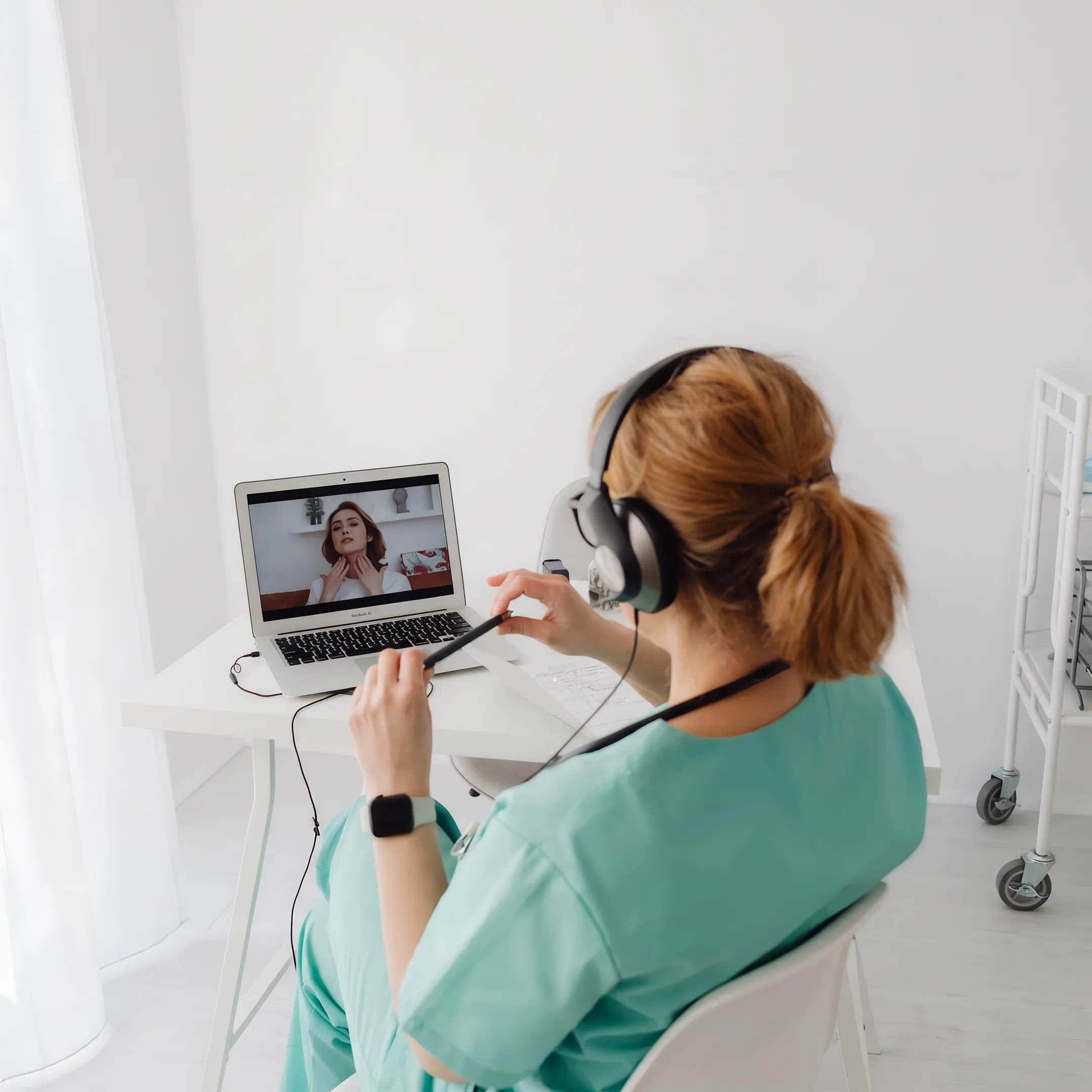 Doctor providing virtual primary care consultation to patient