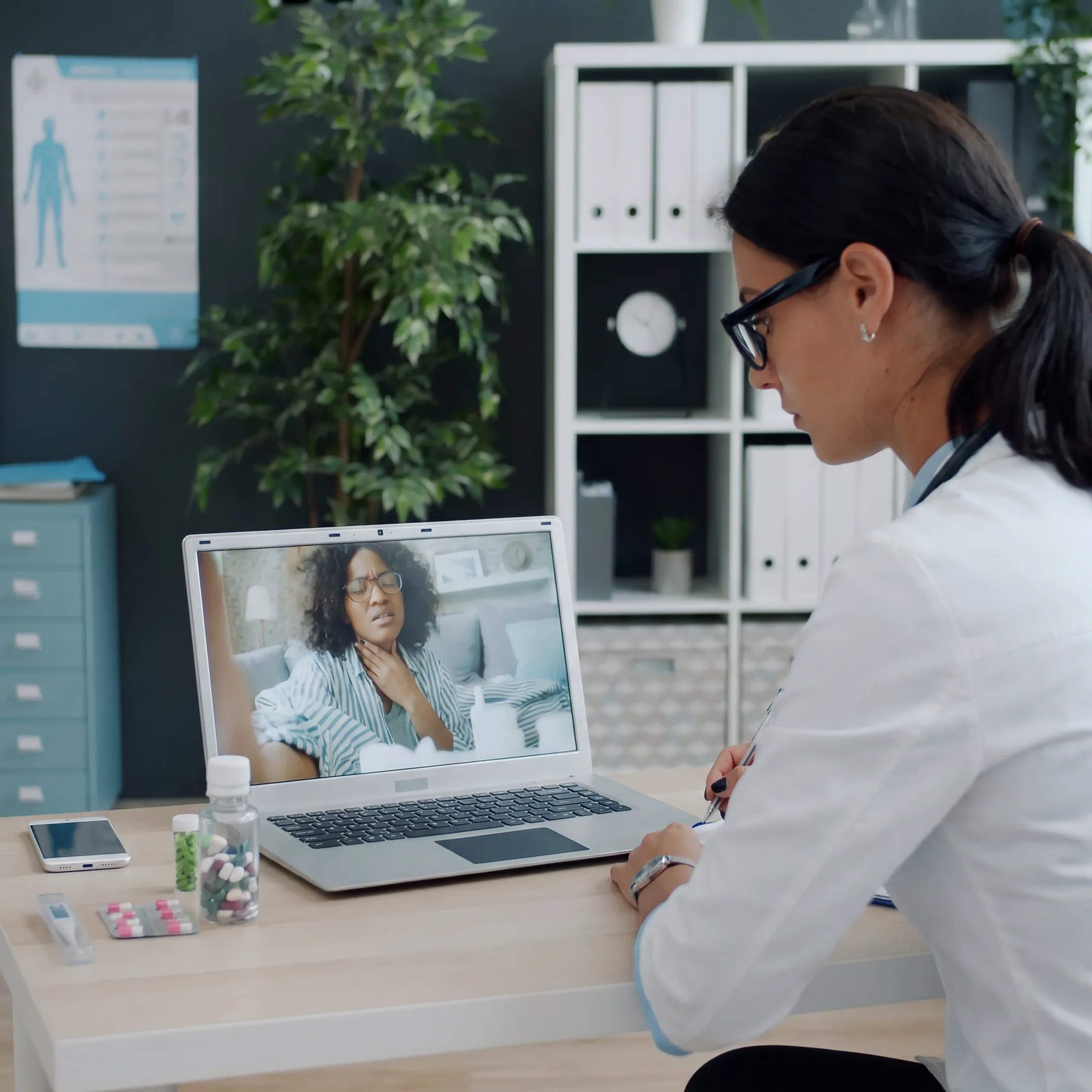Clinician reviewing sore throat symptoms during a telehealth appointment