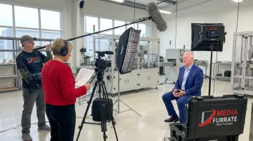 Media Furrate small production crew filming corporate interview on location