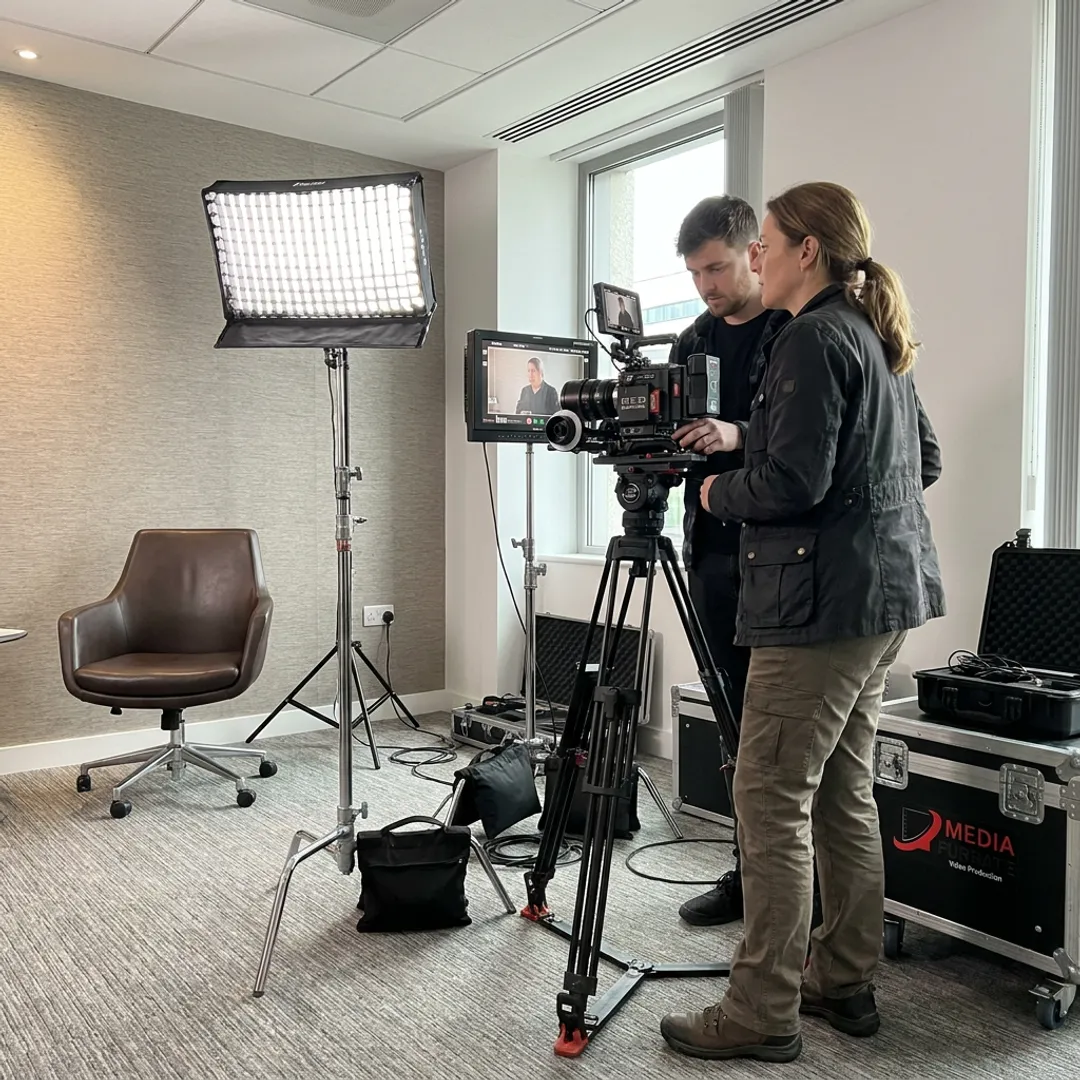 Video producer directing a business shoot