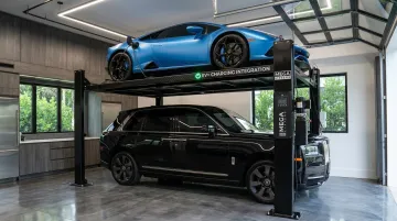 Megalifters custom automobile stacker with integrated EV charging platform installed in garage