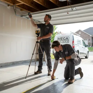Technicians planning a custom car lift installation
